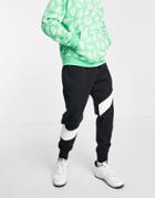 Nike Swoosh Pack Tech Fleece Cuffed Sweatpants In Black