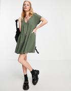 Asos Design Short Sleeve Mini Smock Dress With Large Button Detail In Khaki-green