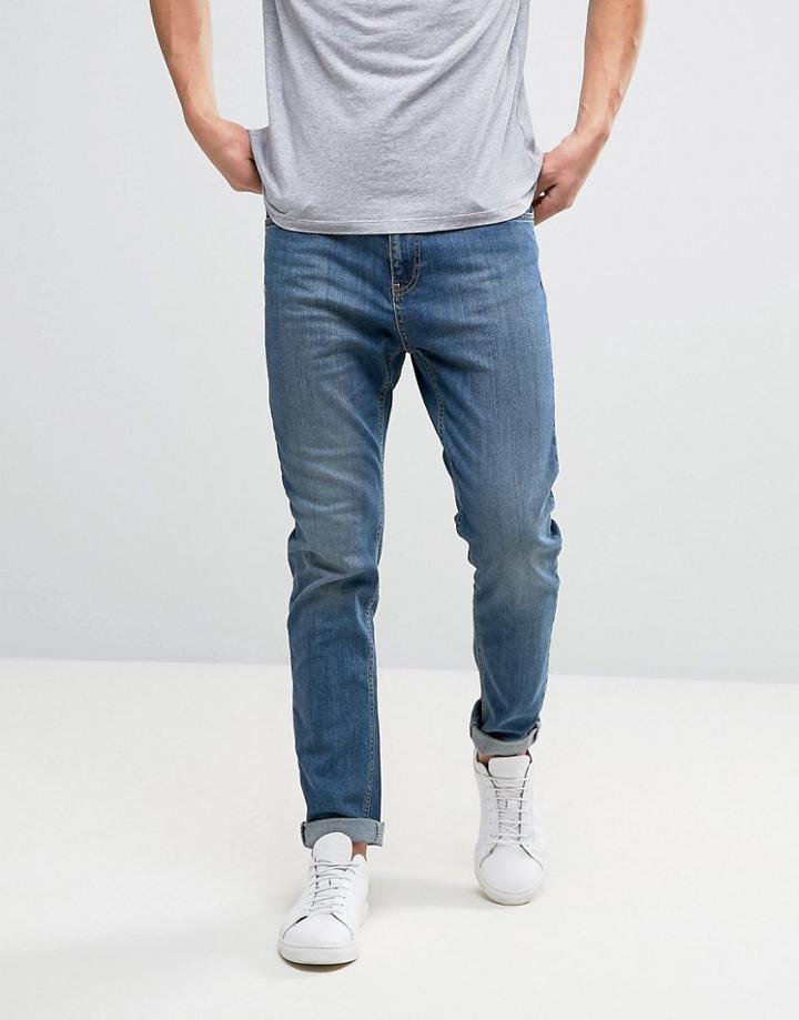 Kiomi Tapered Jeans In Dark Blue Wash - Blue