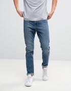 Kiomi Tapered Jeans In Dark Blue Wash - Blue