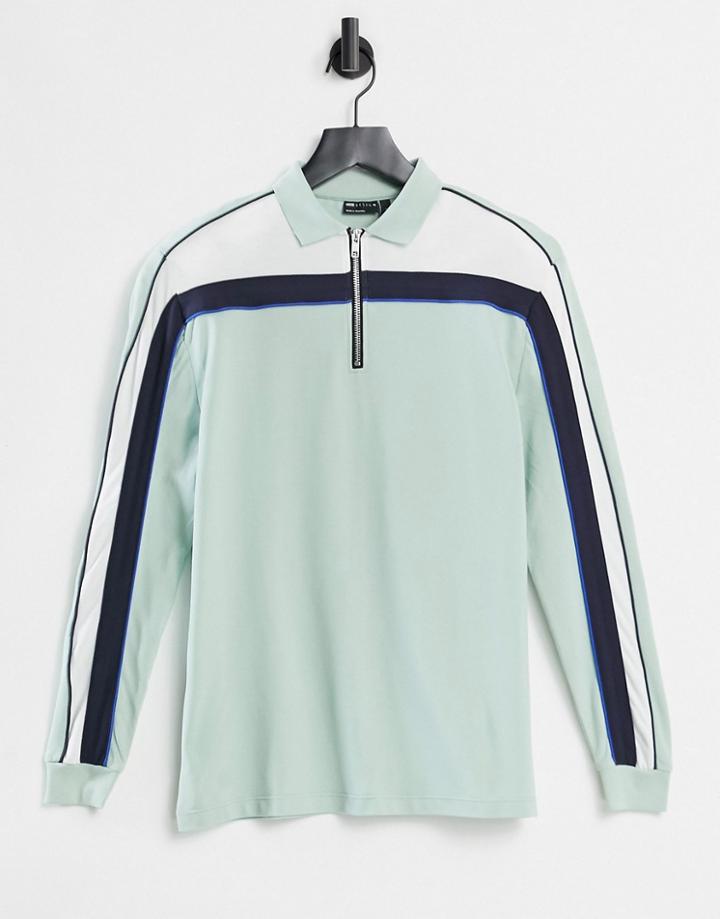 Asos Design Relaxed Long Sleeve Polo Shirt With Zip Neck And Inset Panels In Pastel Green