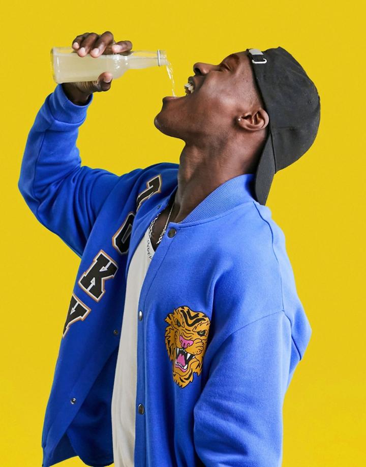 Asos Design Oversized Jersey Bomber Jacket In Blue With Tokyo City Prints-blues