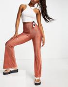Asos Design Plisse Flare Pants In Spot Print In Rust-orange