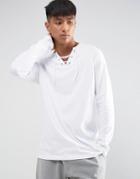 Asos Longline Long Sleeve T-shirt With Lace Up Neck In White - White