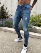 Asos Design Spray On'vintage Look' Jeans With Power Stretch In Dark Wash Blue With Abrasions-blues