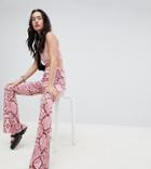 Rokoko Festival Flared Pants In Pink Snake Print - Pink