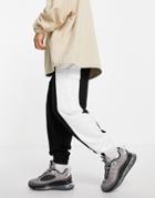 Asos Design Oversized Cargo Sweatpants In Black & White Color Block-navy