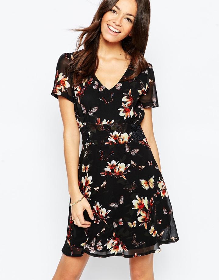 Yumi Tea Dress In Butterfly Floral Print - Black