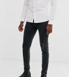 Asos Design Tall 12.5oz Skinny Jeans In Washed Black With Knee Rip And Destroyed Hem
