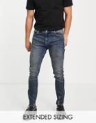 Asos Design Skinny Jeans In Dark Tinted Wash With Moto Detail And Hem Zip-blue