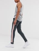 Asos Design Skinny Sweatpants With Side Stripe In Washed Black - Black