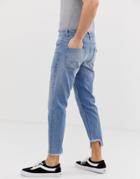 Asos Design Vintage Slim Jeans In Light Wash Blue With Stepped Hem