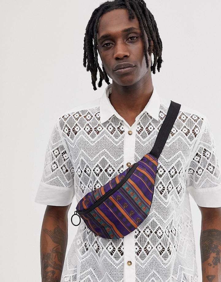 Asos Design Cross Body Fanny Pack In Purple And Orange Geo-tribal