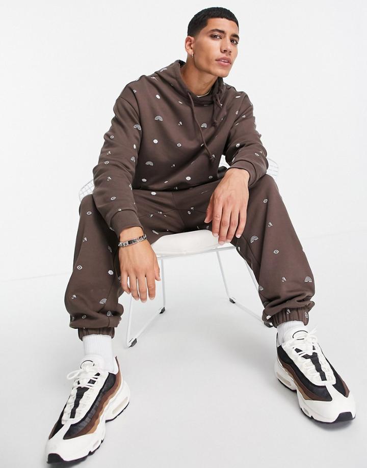 Asos Design Oversized Sweatpants In Brown With All Over Symbol Prints - Part Of A Set-multi