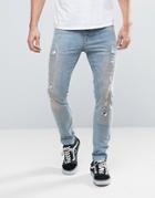 Asos Super Skinny Re-made Jeans With Rips And Repairs In Bleach Wash -