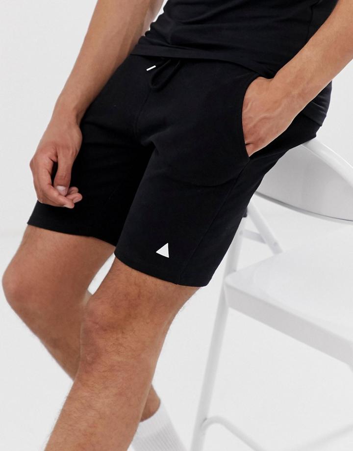 Asos Design Jersey Skinny Shorts In Black With Triangle