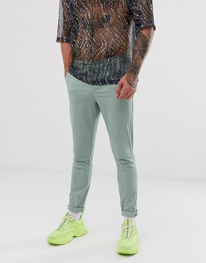 Asos Design Super Skinny Chinos In Light Green