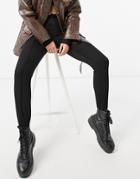 Asos Design Skinny Stirrup Jeans In Washed Black
