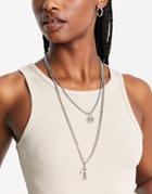 Asos Design Multirow Long Necklace With Cross And Fleur-de-lis Pendants In Silver Tone
