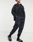 Asos Design Set Oversized Polar Fleece Sweatpants In All Over Monochrome Paisley Print-black