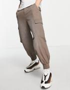 Asos Design Oversized Tapered Pants With Pigment Spray In Gray-grey