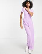 The Frolic Button-through Tailored Jumpsuit In Lilac-purple
