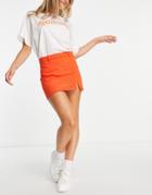 Stradivarius Notch Hem Micro Mini Skirt In Orange