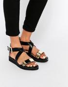 London Rebel Cross Strap Flat Sandal With Gold Metallic Detail - Black