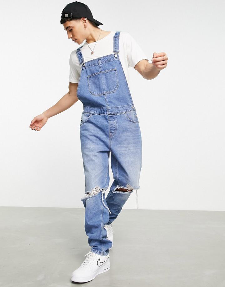 Asos Design Denim Overalls In Mid Wash With Knee Rips-blue