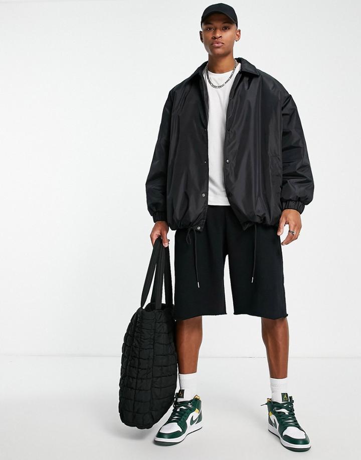 Asos Design Extreme Oversized Shower Resistant Rain Jacket In Black