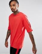 Asos Oversized T-shirt With Eyelet And Metal Ring Sleeve Detail In Red - Red