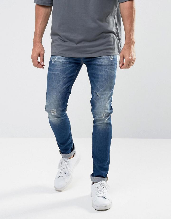 Asos Super Skinny Jeans In Dark Wash Blue With Abrasions - Blue