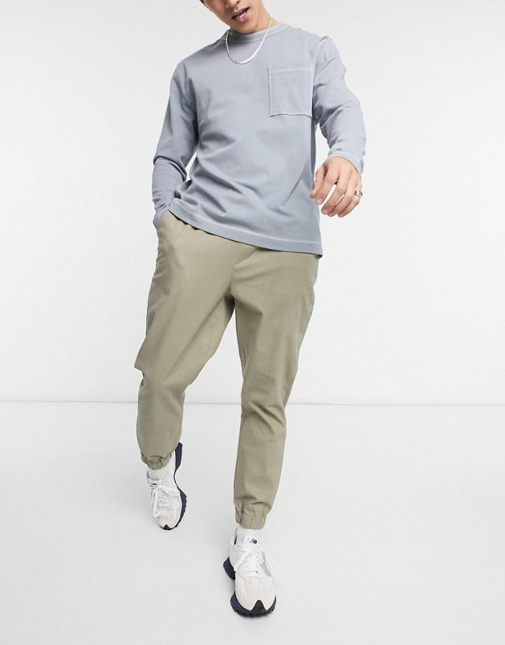 Asos Design Tapered Chino Sweatpants With Elasticized Waist In Light Khaki-neutral