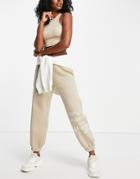 Calvin Klein Multi Logo Sweatpants In Beige-neutral
