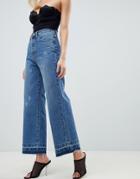 Prettylittlething Wide Leg Raw Hem Jeans In Blue - Blue
