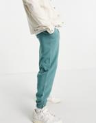 Asos Design Set Oversized Sweatpants In Blue Vintage Wash-blues