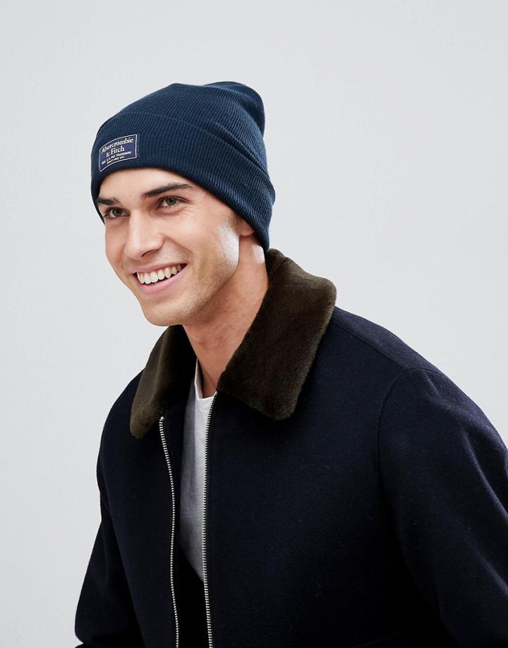 Abercrombie & Fitch Logo Label Turn Up Rib Beanie In Navy - Navy