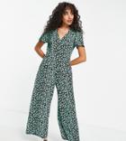Asos Design Petite Bubble Short Sleeve Tea Culotte Jumpsuit In Black And Green Floral-multi