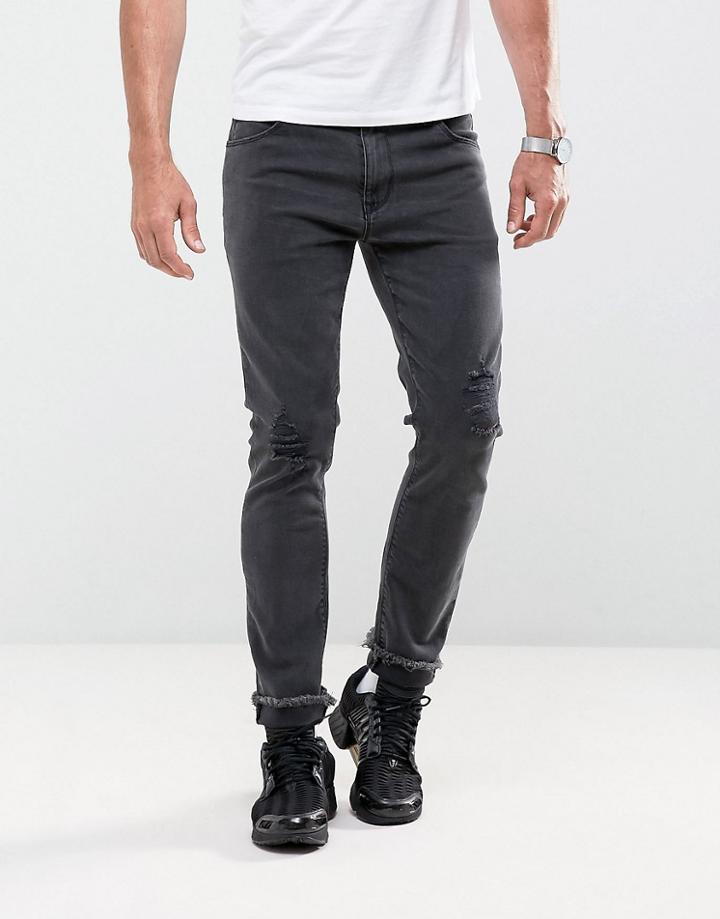 Asos Skinny Ankle Grazer Jeans In Washed Black With Rips And Hem Detail - Black