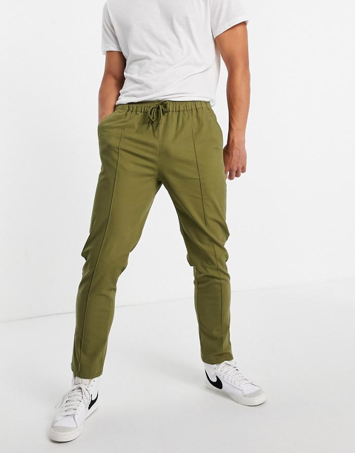 Asos Design Slim Chinos With Pintucks And Elasticized Waist In Khaki-green