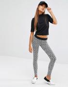 Fila Leggings With All Over Logo Print - Black