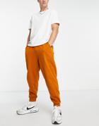 Asos Design Oversized Sweatpants In Washed Orange-brown