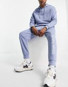 Asos Dark Future Relaxed Sweatpants With Logo Print In Stonewash Blue - Part Of A Set-blues