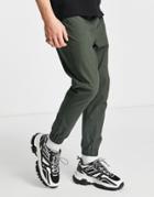Asos Design Tapered Chino Joggers With Elastic Waist In Dark Green