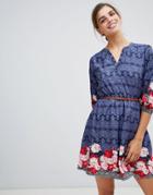 Yumi Belted Dress With 3/4 Sleeves In Rose Border Print - Navy