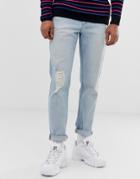 Asos Design Tapered Jeans In Vintage Light Wash With Knee Rips - Blue
