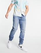 Calvin Klein Jeans Slim Tapered Jeans In Light Wash-blues