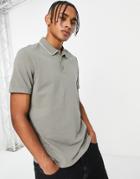 Asos Design Pique Polo With Contrast Tipping Detail In Beige With White Tipping Detail-green