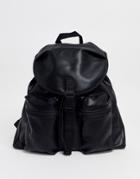 Asos Design Faux Leather Backpack In Black With Front Pockets