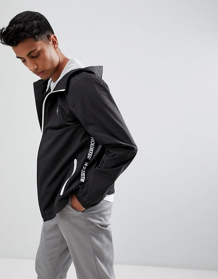 Hollister Hooded Windbreaker Jacket Seagull Logo In Black - Black